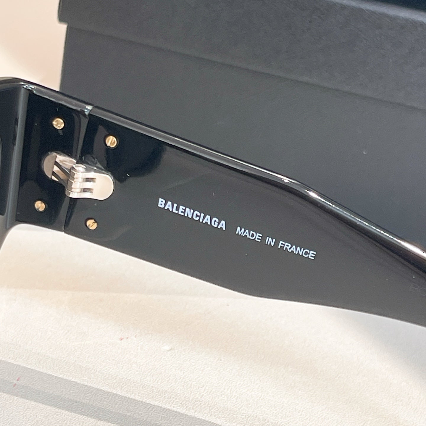 Sunglass temple with "BALENCIAGA" text and "MADE IN FRANCE"