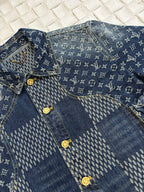 Louis Vuitton long-sleeve denim jacket close-up with blue monogram button placket