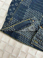 Louis Vuitton denim jacket hem and pocket area with blue monogram patchwork