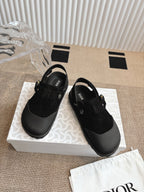 Unisex Dior black buckle shoes with perforated strap detail and chunky sole