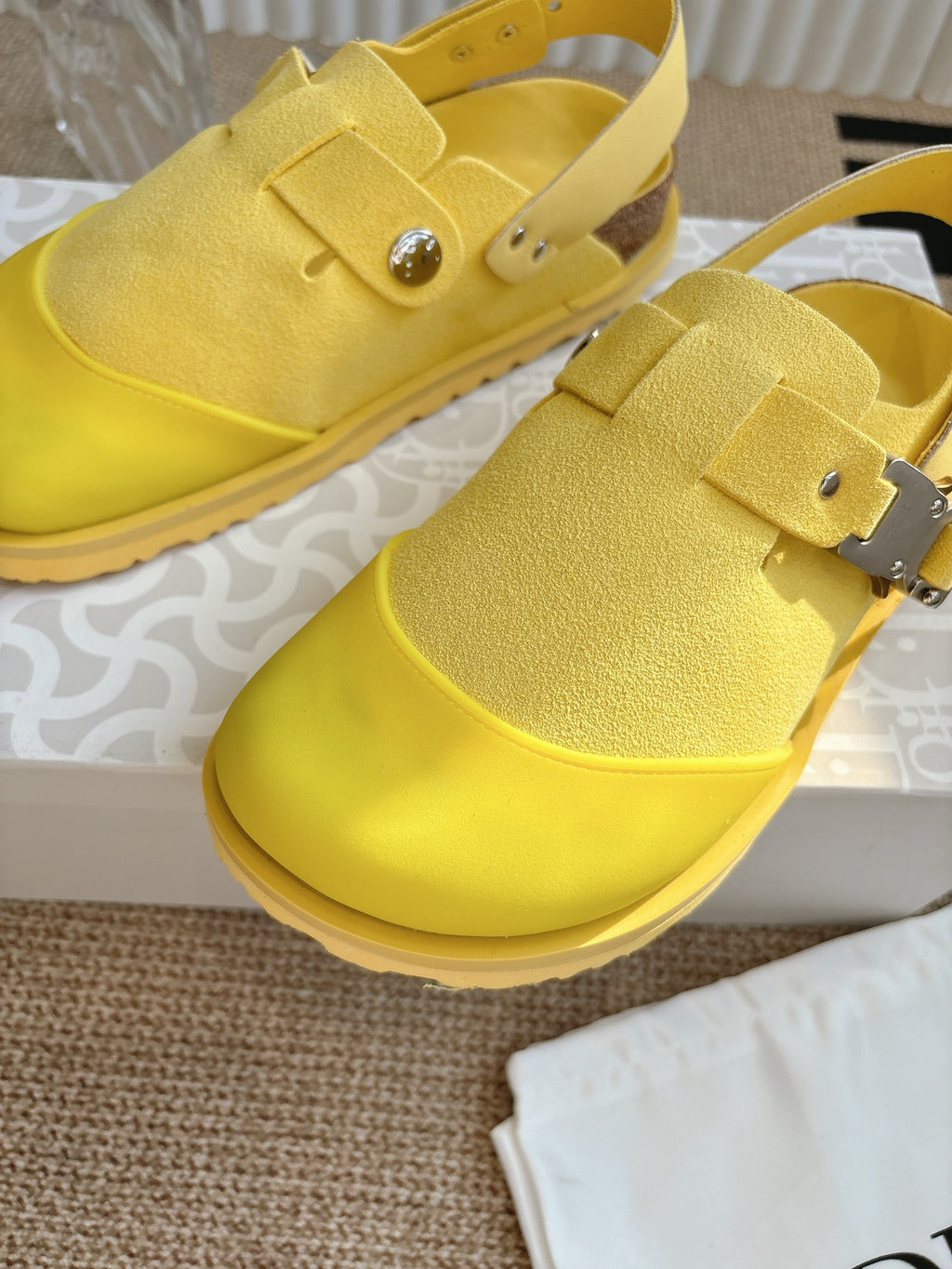 Yellow unisex shoes with hook-and-buckle straps and cushioned sole