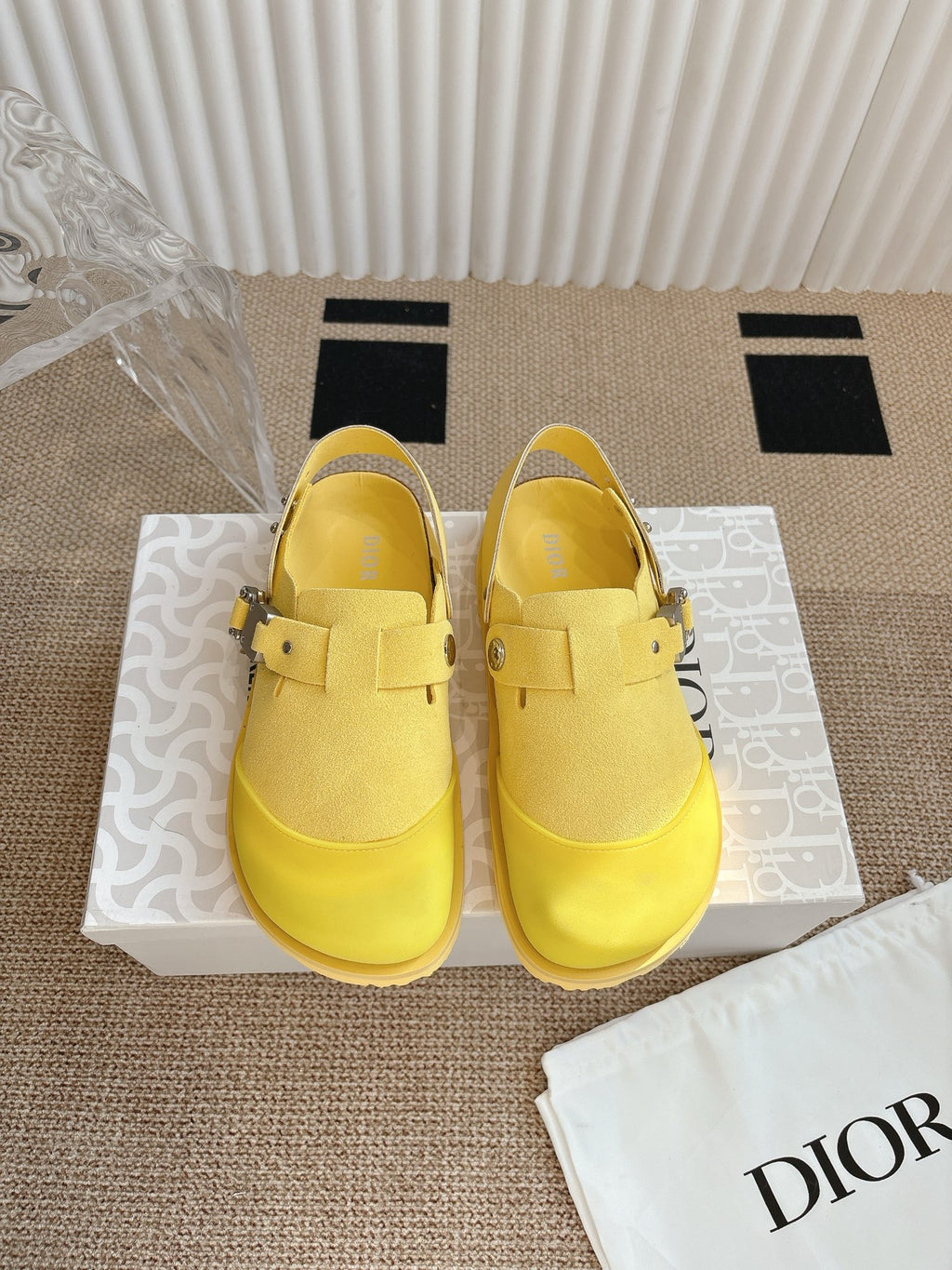 Yellow unisex slip-on shoes with buckle straps and textured sole