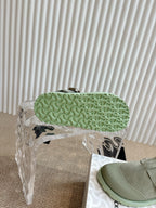 Unisex slip-on shoe outsole, textured light green tread with rear heel grip