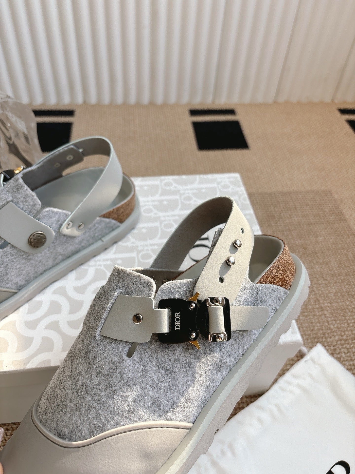 Dior unisex shoes with gray glitter uppers and black-and-gold strap clasp
