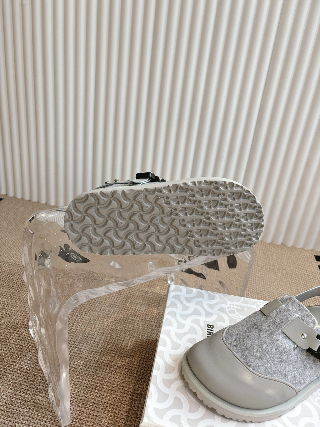 Dior unisex shoe outsole detail with textured tread and gray glitter upper