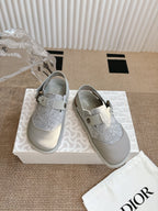 Dior unisex shoes, gray glitter panels with white strap and metal buckle detail