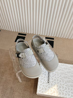 Dior unisex shoes with gray glitter vamp, white straps, and metal buckle hardware