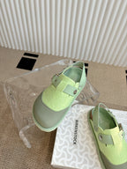 Unisex green sneakers with strap, open top lining, and cushioned footbed