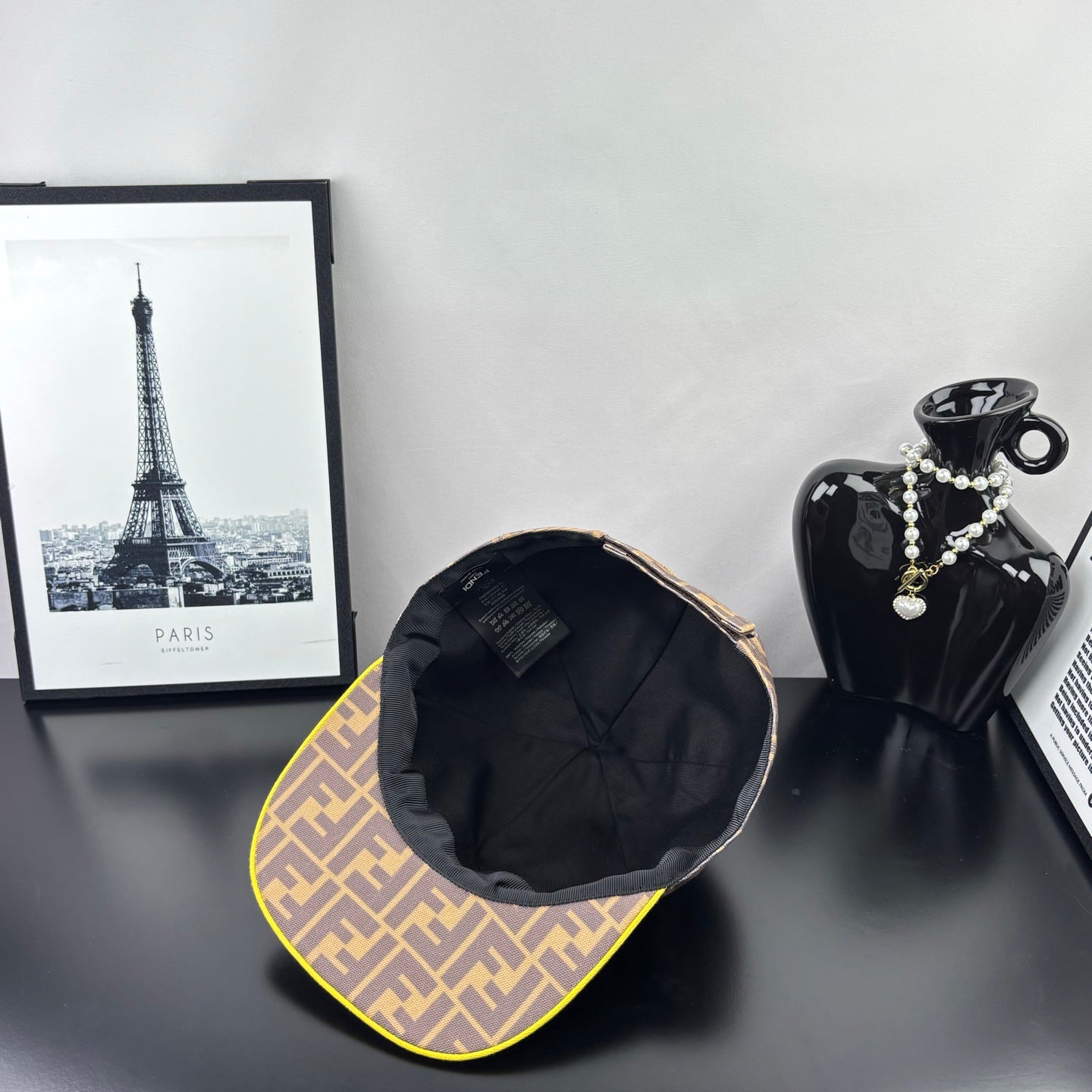 Fendi baseball cap interior view, black lining with folded seam and label