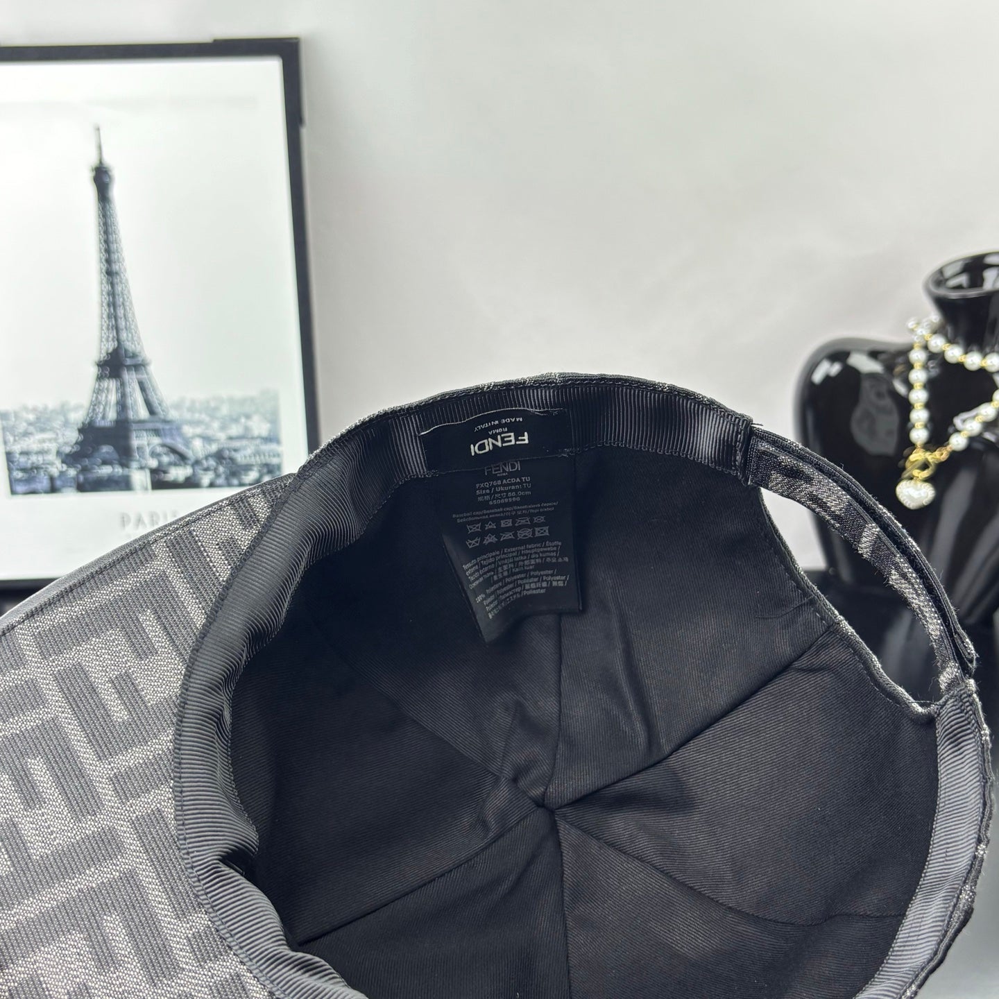 Gray FF monogram cap interior with black lining and size label