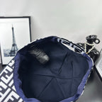 Fendi cap interior with navy lining and stitched band trim, open crown view