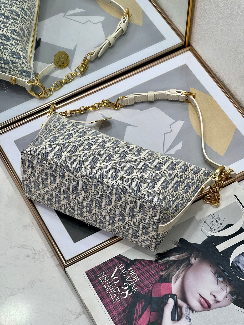 Dior monogram shoulder bag with chain strap and white leather trim, blue and white