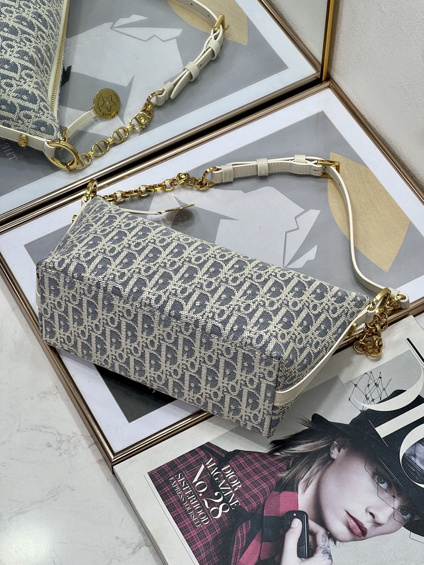 Dior monogram shoulder bag with chain strap and white leather trim, blue and white