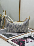 Dior monogram hobo bag in blue and white with top handles and chain shoulder strap