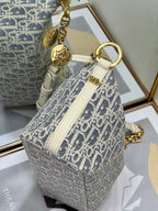 Dior monogram mini handbag with ring handle and white trim, blue and white