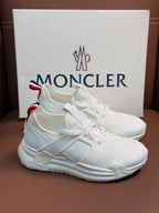 Moncler white sneakers with red and navy striped heel detail and padded sole