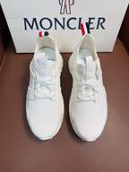 Moncler white lace-up sneakers with textured upper and chunky sole