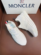Moncler white sneakers, side view, lace-up with cushioned sole