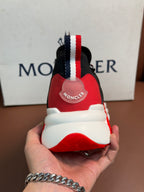 Moncler luxury shoes with red and black heel, multicolor striped pull loop, white sole