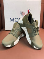 Moncler luxury sneakers in olive green with layered straps and lace-up front