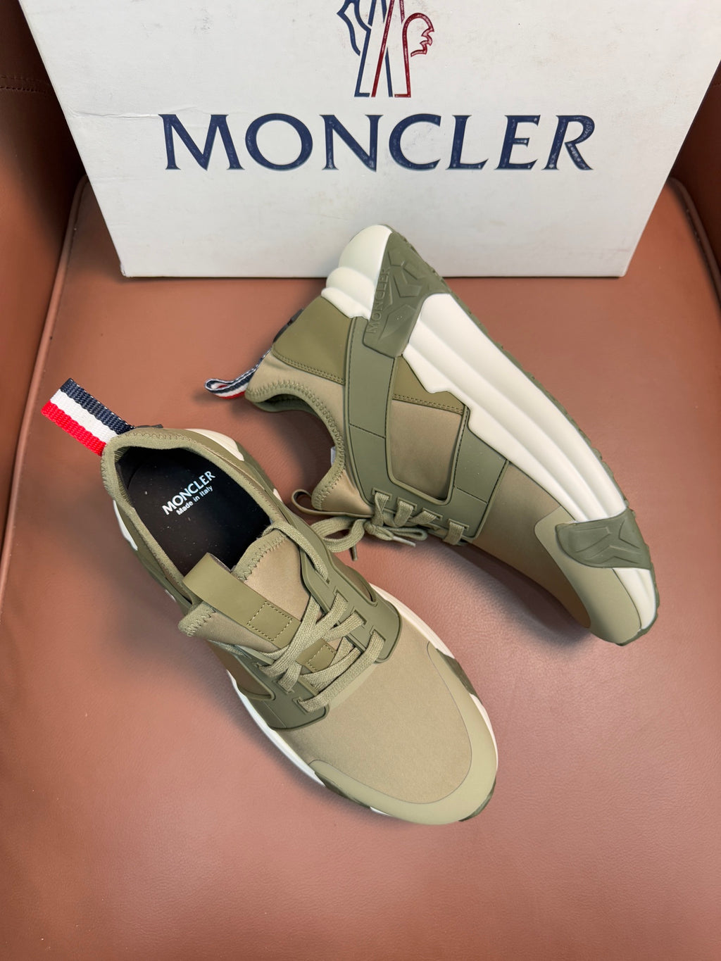 Moncler luxury sneakers, olive green suede upper and white midsole