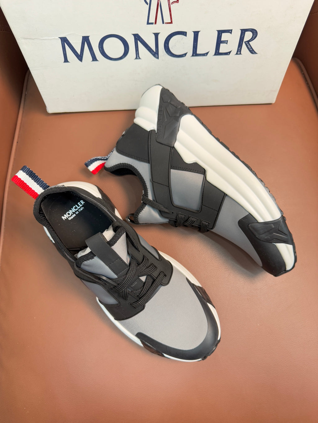 Moncler lace-up sneakers, dark gray uppers with black panels and white sole