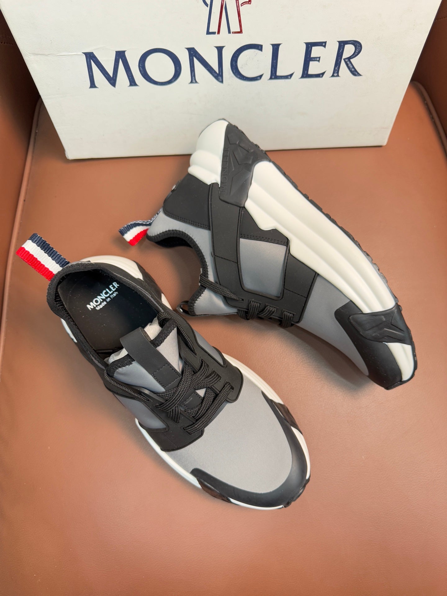 Moncler lace-up sneakers, dark gray uppers with black panels and white sole