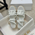 Espadrille wedge sandals, front view of white leather straps on braided jute sole
