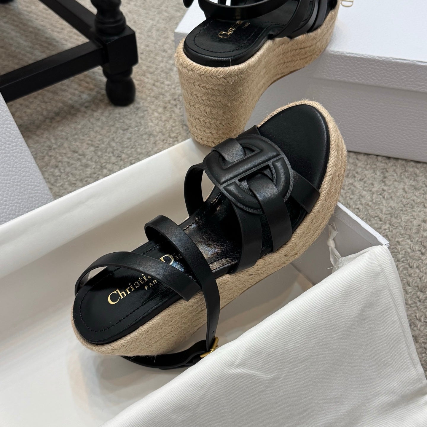 Black platform espadrille sandals with crossover straps and braided platform