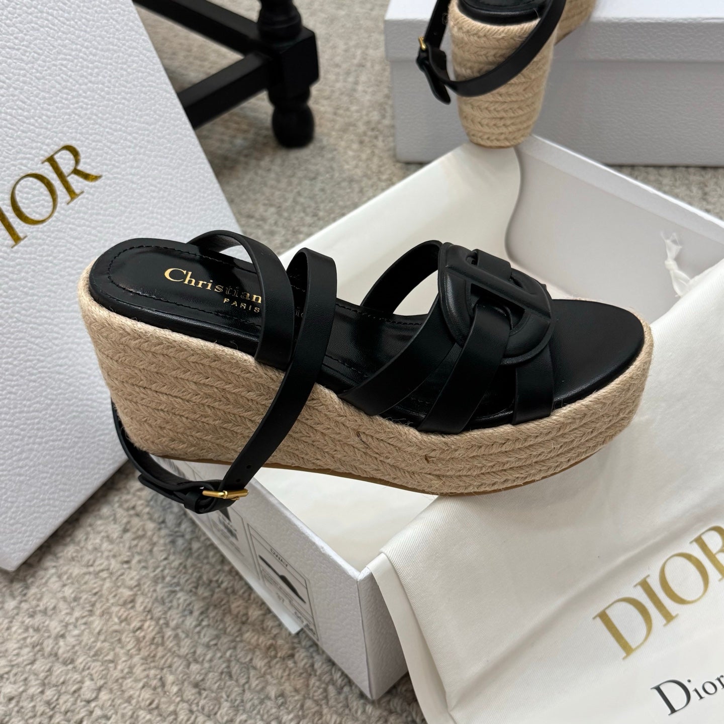 Black platform espadrille sandals with front crossover strap and braided wedge