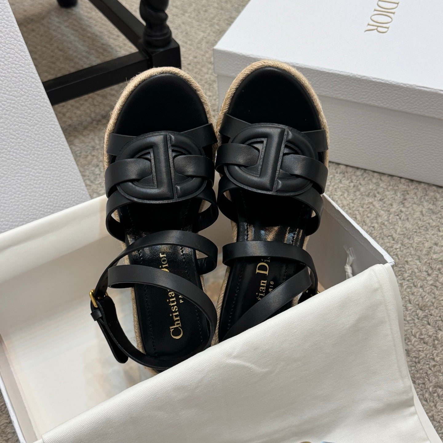 Black platform espadrille sandals with layered ankle straps and braided wedge