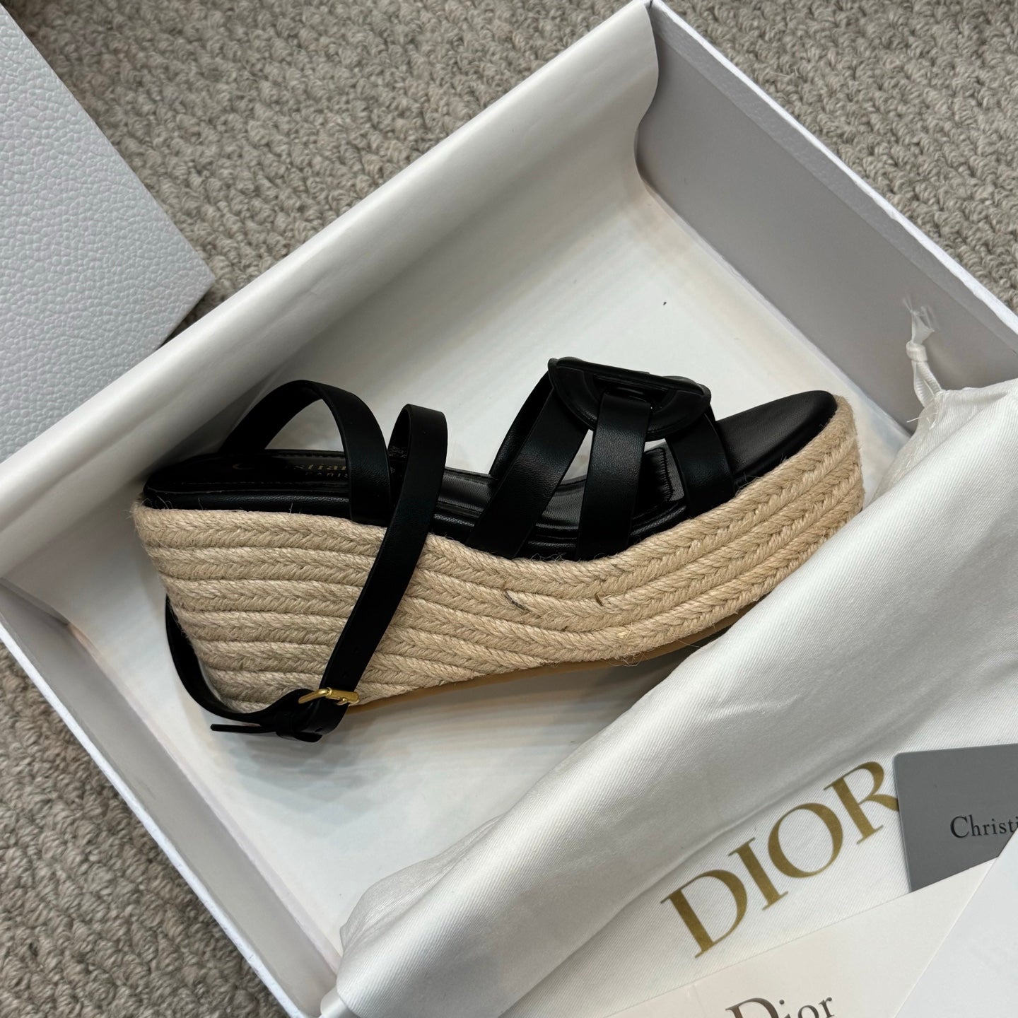 Black platform espadrille sandals with crossover straps and braided jute platform
