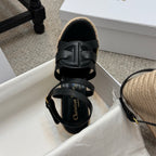 Black platform espadrille sandals with front strap design and braided jute wedge