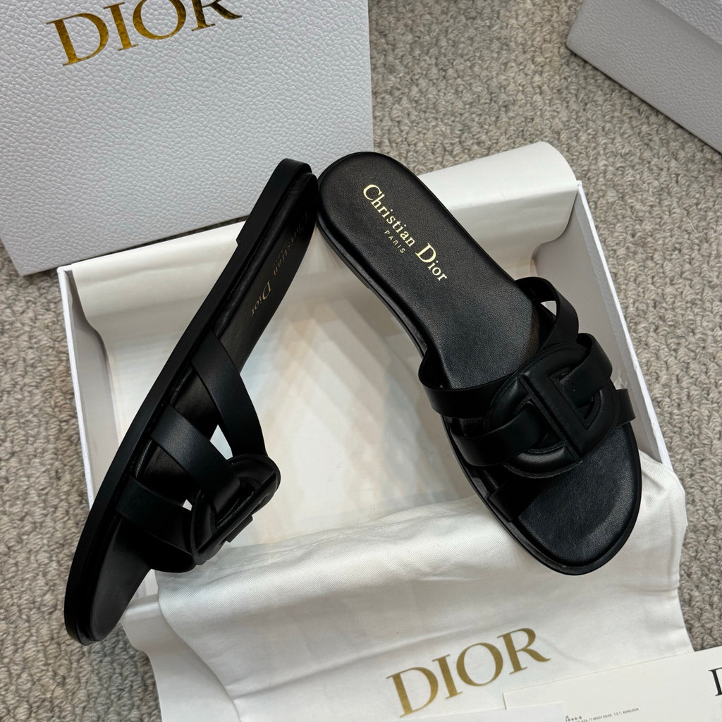 Dior black slide sandal with thick wide straps and textured strap details