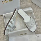 White Dior slide mules in gift box with wide strap and dark sole edge