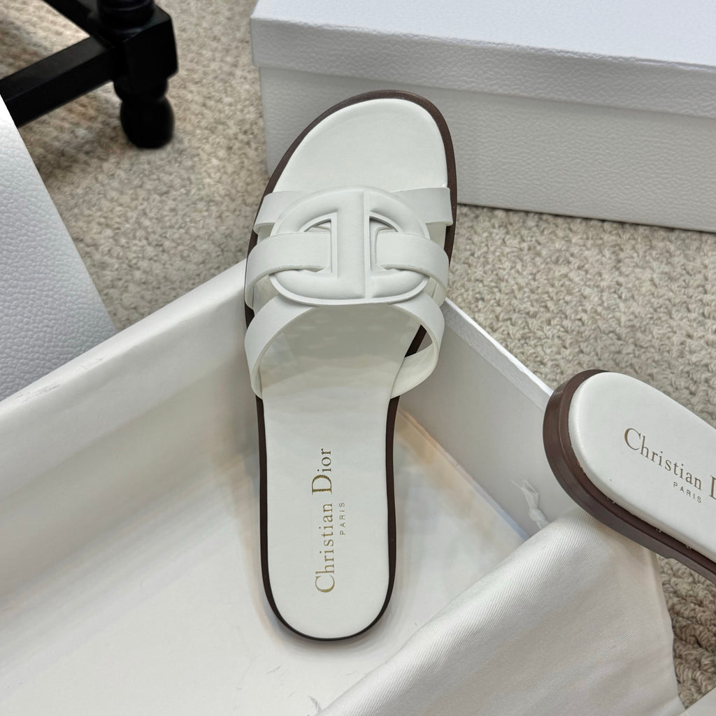 White Dior slide sandal with oval footbed and wide front strap