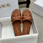 Brown leather Dior slide sandals pair, open toe and knotted strap detail