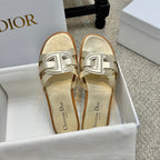 Dior gold slide sandals with logo buckle on straps and cushioned footbed
