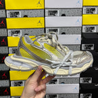 Balenciaga unisex sneakers, metallic gray with yellow side stripe and gray laces