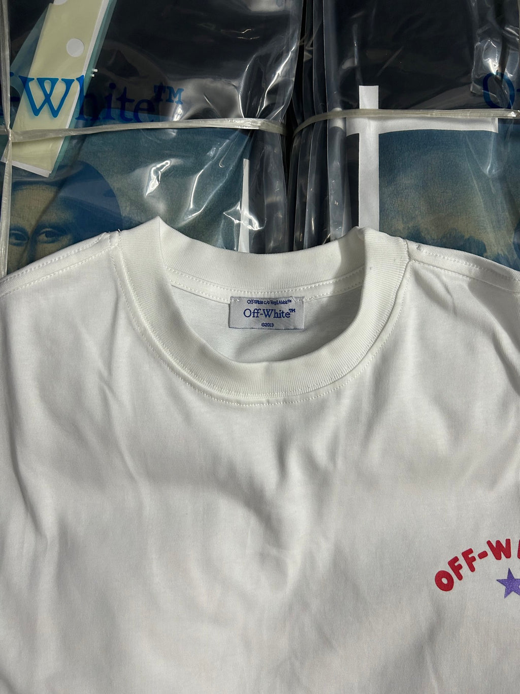Off-White white T-shirt, crew neck close-up with brand tag