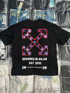 Black crewneck T-shirt with large red and white X graphic and 'DESIGNED IN MILAN' text