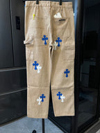 Beige denim cargo pants with cross patches, back view and belt loops