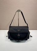 Prada nylon shoulder bag in dark navy with flap and gold-tone hardware