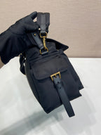 Prada nylon mini bag with flap, dark navy and front buckle strap