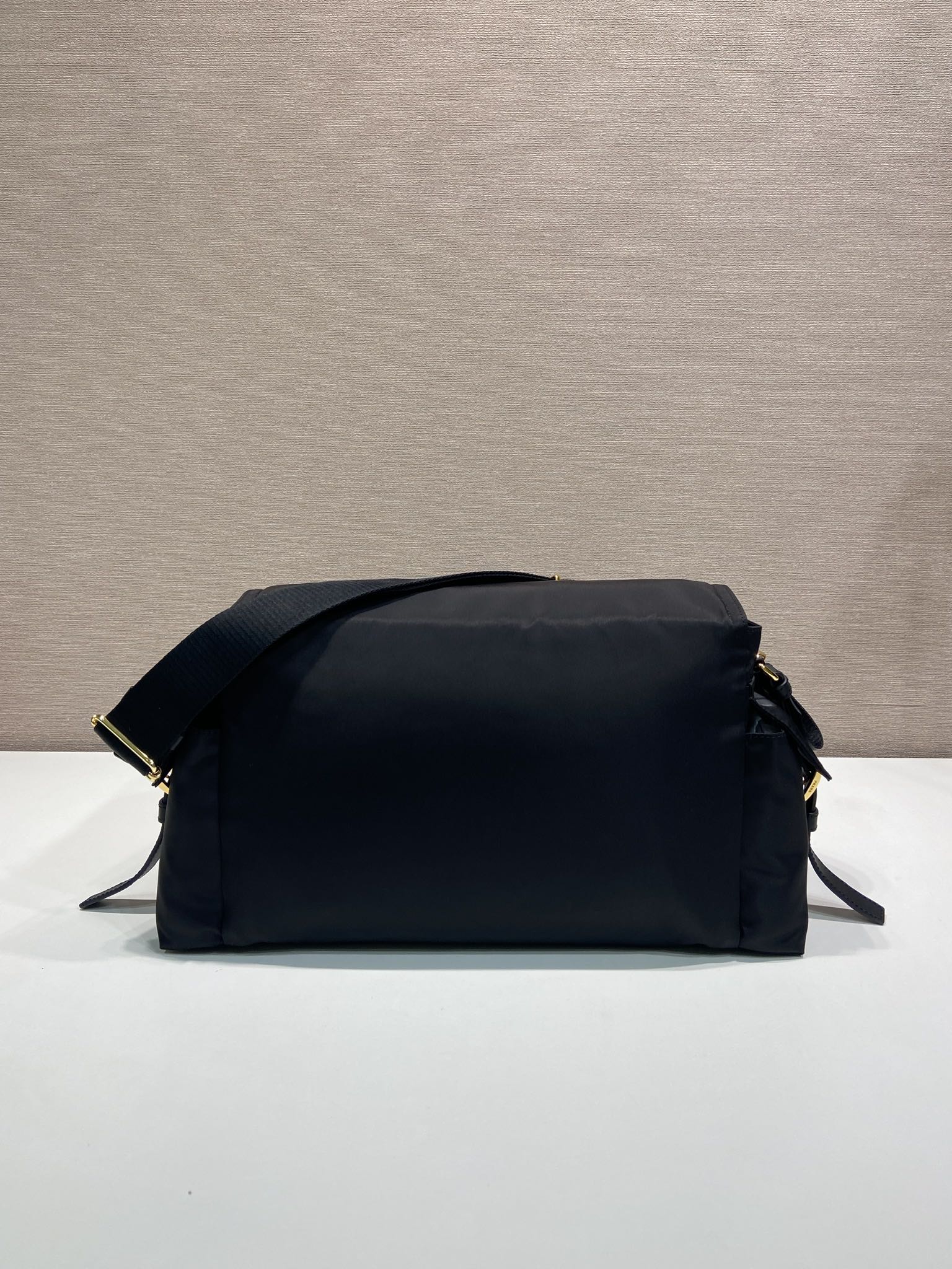 Prada nylon duffel-style bag, dark navy with top handle and side straps