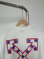 Off-White T-shirt close-up of front graphic with red, white, and blue star shapes