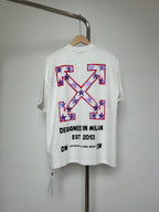 Off-White T-shirt with large front graphic, stars and text "DESIGNED IN MILAN"