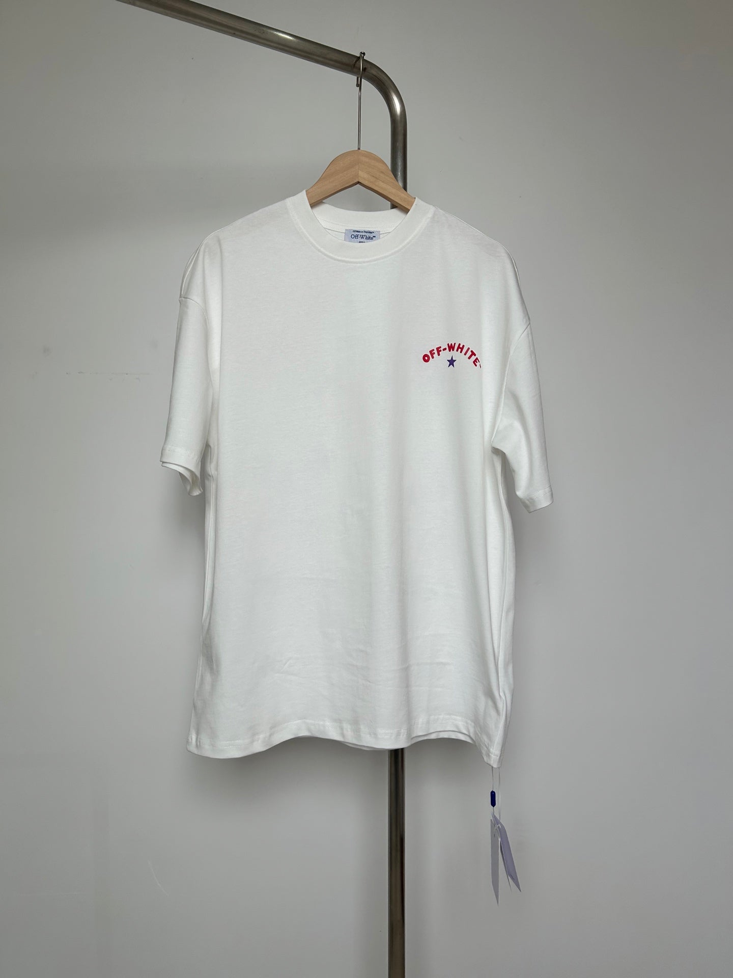 Off-White T-shirt, off-white crewneck with small red and blue logo on chest