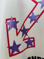 Off-White T-shirt close-up of large star and zigzag shapes in blue and red