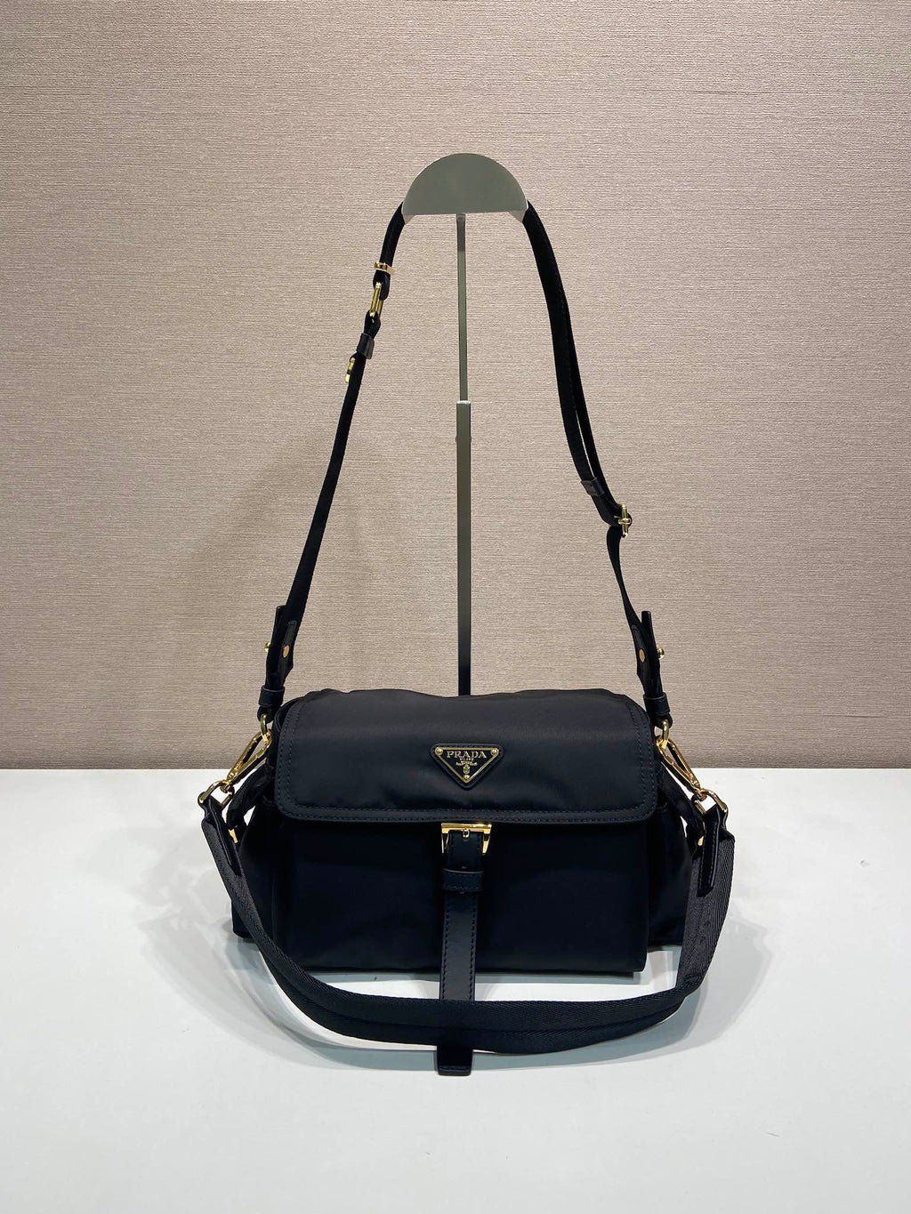 Prada crossbody bag, dark navy, front flap and adjustable shoulder strap